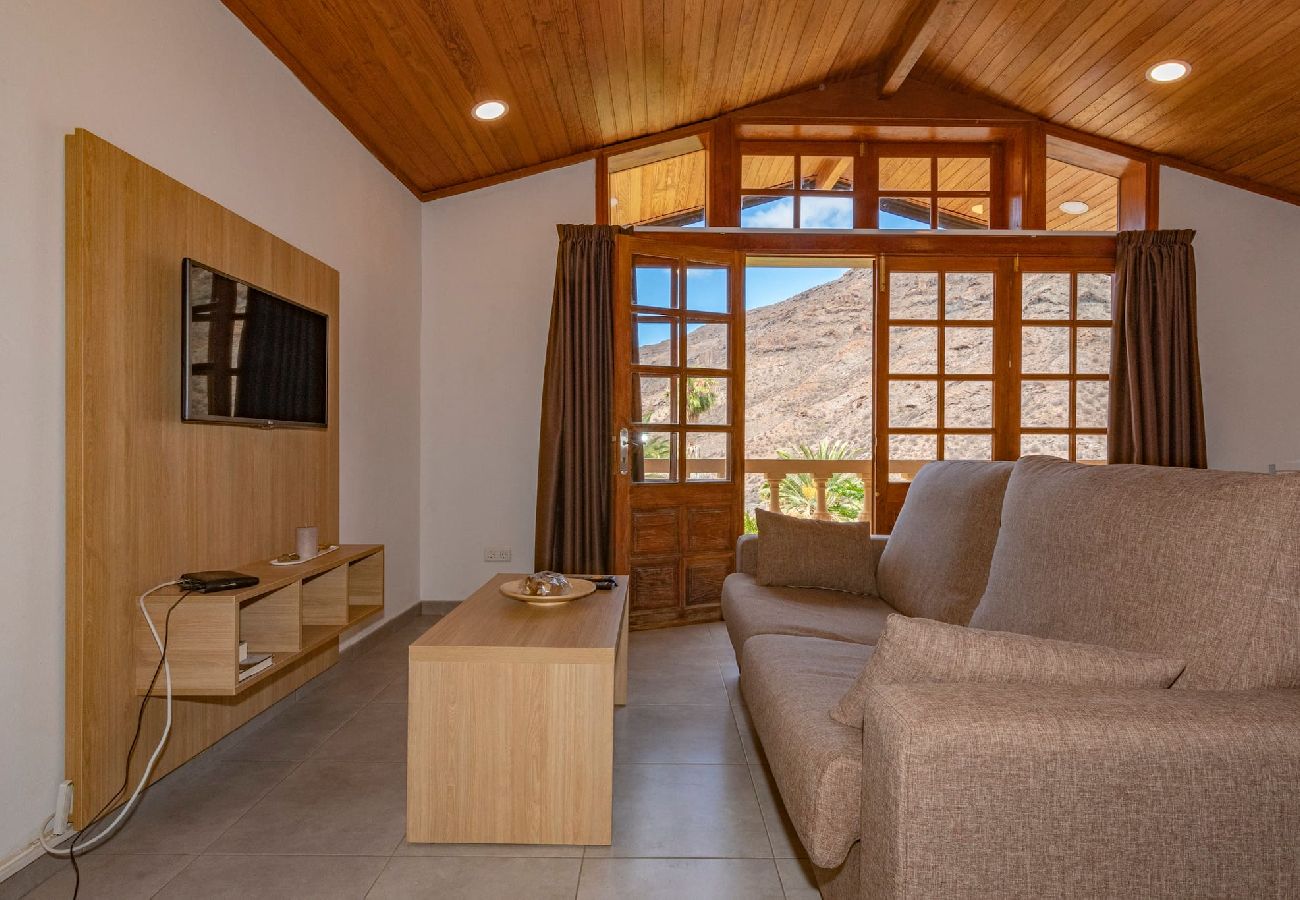 Huis in Mogán - GC0283 Vakantiehuis met gedeeld zwembad in Mogán