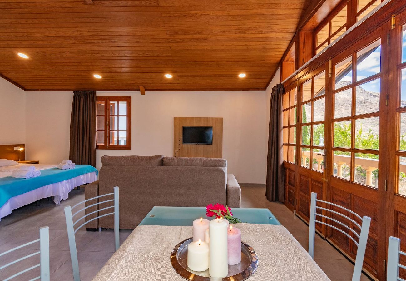 Huis in Mogán - GC0283 Vakantiehuis met gedeeld zwembad in Mogán