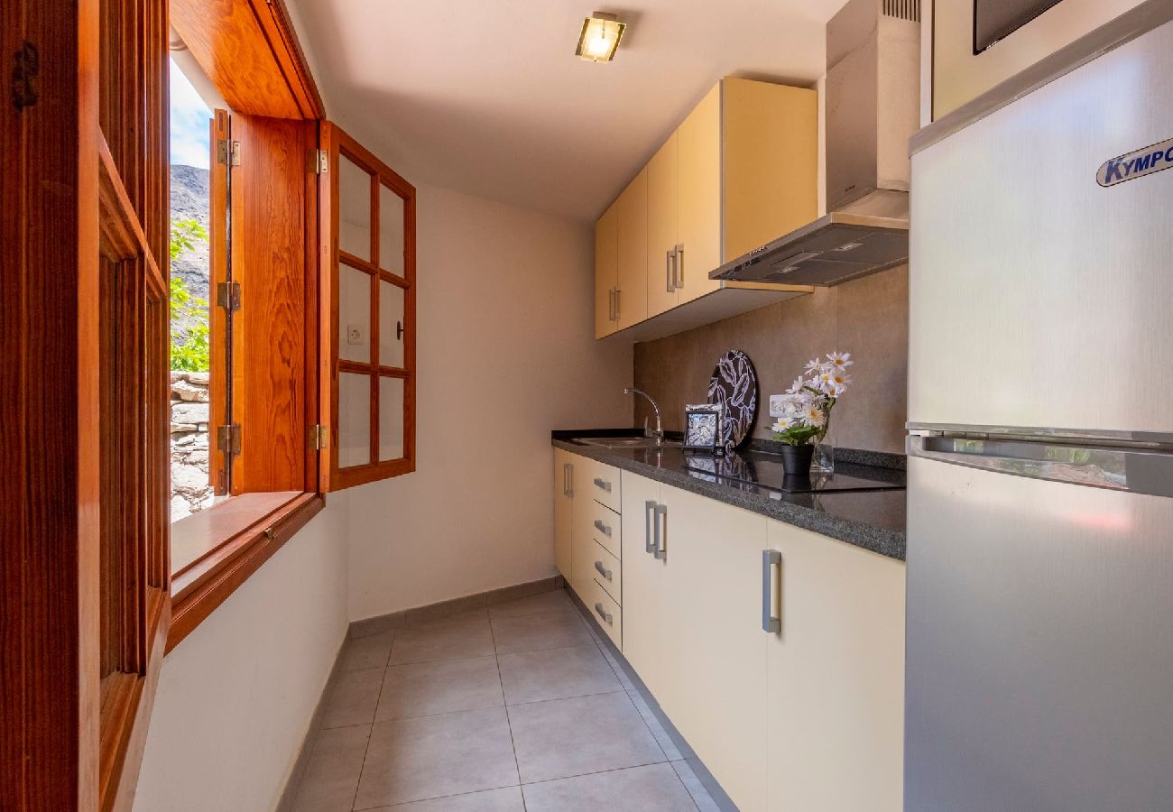 Huis in Mogán - GC0283 Vakantiehuis met gedeeld zwembad in Mogán