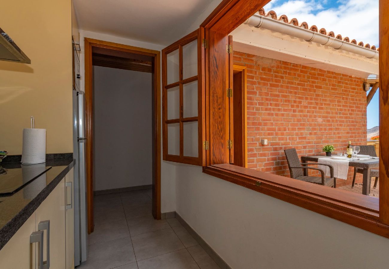 Huis in Mogán - GC0283 Vakantiehuis met gedeeld zwembad in Mogán