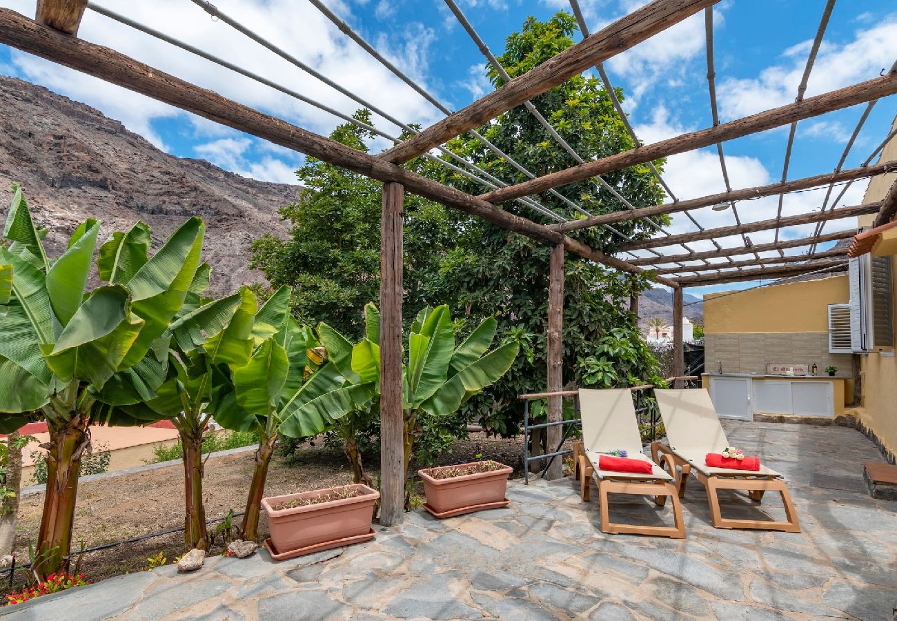 Huis in Mogán - GC0284 Vakantiehuis met gedeeld zwembad in Mogán