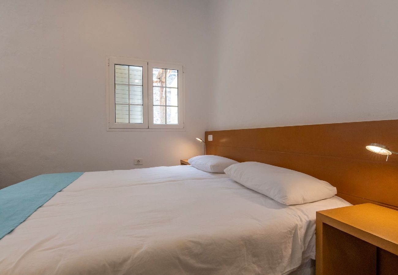 Huis in Mogán - GC0284 Vakantiehuis met gedeeld zwembad in Mogán