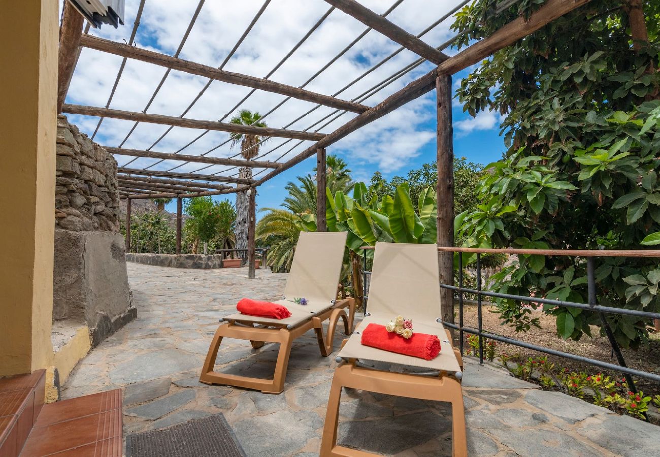 Huis in Mogán - GC0284 Vakantiehuis met gedeeld zwembad in Mogán